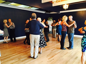 photo of a group class at Step It Up Ballroom Society